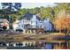 Spacious lakefront home with a large deck and beautiful backyard at 12021 Scottish Ct, Fayetteville, GA 30215