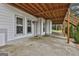 Covered patio with exterior access and a view of the backyard at 12021 Scottish Ct, Fayetteville, GA 30215