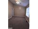 Large bedroom with ceiling fan and carpet at 3044 Waldrop Cir, Decatur, GA 30034