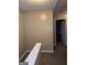 Upper hallway with neutral paint and carpet at 3044 Waldrop Cir, Decatur, GA 30034