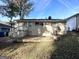 House exterior showcasing a backyard with patio and landscaping at 2228 Sw Springdale Cir, Atlanta, GA 30315