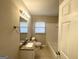 Clean bathroom featuring granite countertop vanity, tub, and shower at 2228 Sw Springdale Cir, Atlanta, GA 30315