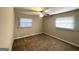 Bright bedroom with carpeted floors and ceiling fan at 2228 Sw Springdale Cir, Atlanta, GA 30315