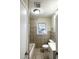 Clean bathroom with tile flooring, bathtub, and a vanity at 8406 Norris Lake Rd, Snellville, GA 30039