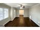 Spacious living room with hardwood floors and neutral paint at 8406 Norris Lake Rd, Snellville, GA 30039