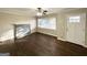Bright living room with hardwood floors, fireplace and neutral walls at 8406 Norris Lake Rd, Snellville, GA 30039