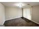 Spacious basement room with carpet, sliding door, and vinyl flooring at 2910 Jerome Rd, Atlanta, GA 30349