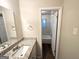Bathroom with granite countertop vanity and bathtub at 2910 Jerome Rd, Atlanta, GA 30349