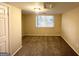 Simple bedroom with neutral decor and carpet at 2910 Jerome Rd, Atlanta, GA 30349