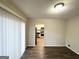 Dining room with view of kitchen and sliding glass doors to patio at 2910 Jerome Rd, Atlanta, GA 30349