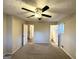 Main bedroom with ensuite bathroom access and carpet flooring at 2910 Jerome Rd, Atlanta, GA 30349