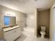 Clean bathroom with granite vanity and tile shower/tub at 1327 Sharon Nw St, Atlanta, GA 30314