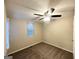 Bedroom with ceiling fan, window, and neutral carpeting at 1327 Sharon Nw St, Atlanta, GA 30314