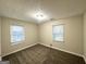 Spacious bedroom with neutral walls and carpet flooring at 1327 Sharon Nw St, Atlanta, GA 30314