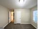Bright bedroom featuring two windows and carpet flooring at 1327 Sharon Nw St, Atlanta, GA 30314