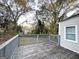 Wooden deck overlooking a backyard with mature trees at 1327 Sharon Nw St, Atlanta, GA 30314