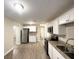Modern kitchen with granite countertops and stainless steel appliances at 1327 Sharon Nw St, Atlanta, GA 30314