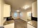 Updated kitchen with granite countertops and white cabinets at 1327 Sharon Nw St, Atlanta, GA 30314