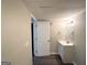 Basement bathroom with vanity and mirror at 220 Oakcliff Nw Ct, Atlanta, GA 30331