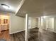 Finished basement featuring vinyl flooring and a bathroom at 220 Oakcliff Nw Ct, Atlanta, GA 30331