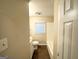 Clean bathroom with tub, toilet and vanity at 220 Oakcliff Nw Ct, Atlanta, GA 30331