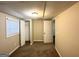 Bright bedroom with carpet flooring, closet, and window at 220 Oakcliff Nw Ct, Atlanta, GA 30331