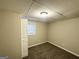 Simple bedroom with carpet, window, and door at 220 Oakcliff Nw Ct, Atlanta, GA 30331