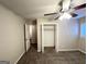 Charming bedroom with ceiling fan and walk-in closet at 220 Oakcliff Nw Ct, Atlanta, GA 30331
