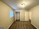 Spacious bedroom with large closet and access to hallway at 220 Oakcliff Nw Ct, Atlanta, GA 30331