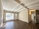 Bright living room with hardwood floors and access to patio at 3010 Pasadena Dr, Decatur, GA 30032