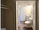 Bathroom with toilet and granite vanity at 4982 Millstone Walk, Stone Mountain, GA 30088