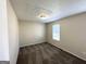 Simple bedroom with window and neutral wall colors at 4982 Millstone Walk, Stone Mountain, GA 30088