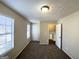 Bright bedroom with two windows and access to hallway at 4982 Millstone Walk, Stone Mountain, GA 30088