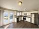 Modern kitchen with stainless steel appliances and granite countertops at 4982 Millstone Walk, Stone Mountain, GA 30088