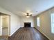 Living room featuring fireplace and hardwood floors at 4982 Millstone Walk, Stone Mountain, GA 30088