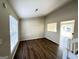 Bright and airy living area featuring hardwood flooring at 4982 Millstone Walk, Stone Mountain, GA 30088