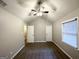 Bright bedroom with ceiling fan and two closets at 55 Stone Creek Dr, Covington, GA 30016