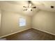 Spacious bedroom with ceiling fan and window blinds at 55 Stone Creek Dr, Covington, GA 30016