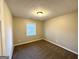 Simple bedroom with ceiling light and window blinds at 55 Stone Creek Dr, Covington, GA 30016