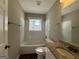 Clean bathroom with granite vanity, tile shower/tub combo, and neutral decor at 2057 Sombrero Se Way, Atlanta, GA 30316