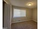 Spacious bedroom with neutral walls, carpet flooring, and ample natural light at 2057 Sombrero Se Way, Atlanta, GA 30316