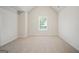 Bright bedroom featuring a large window and neutral decor at 2275 Lovejoy Rd # 72, Hampton, GA 30228