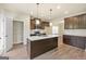Kitchen island with granite countertop and stainless steel appliances at 2275 Lovejoy Rd # 72, Hampton, GA 30228