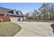 Two-car garage with additional storage shed at 395 W Mcintosh Rd, Brooks, GA 30205