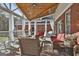 Spacious screened porch, perfect for relaxing and entertaining at 395 W Mcintosh Rd, Brooks, GA 30205