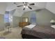 Spacious bedroom with a metal bed frame and two windows at 4378 Ridge Ct, Loganville, GA 30052