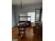 Empty dining room with hardwood floors, round table, and built-in hutch at 43 Thurman Rd, Stockbridge, GA 30281