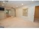 Spacious finished basement with carpeting, multiple rooms and doors at 125 Blackjack Ct, Fayetteville, GA 30215