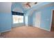 Bedroom with vaulted ceiling, window, and ceiling fan at 125 Blackjack Ct, Fayetteville, GA 30215