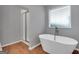 Bathroom with soaking tub and walk-in shower at 5374 Tolar Rd # 79, South Fulton, GA 30213